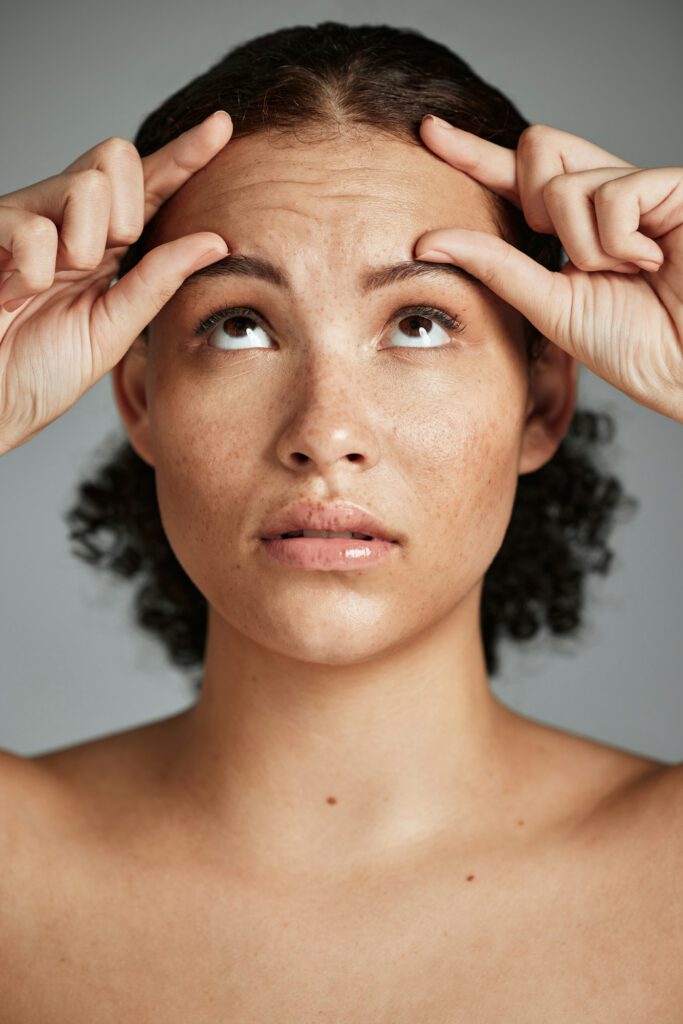 Wrinkles, skincare and beauty worry of a black woman with wellness facial, botox help and face prp.